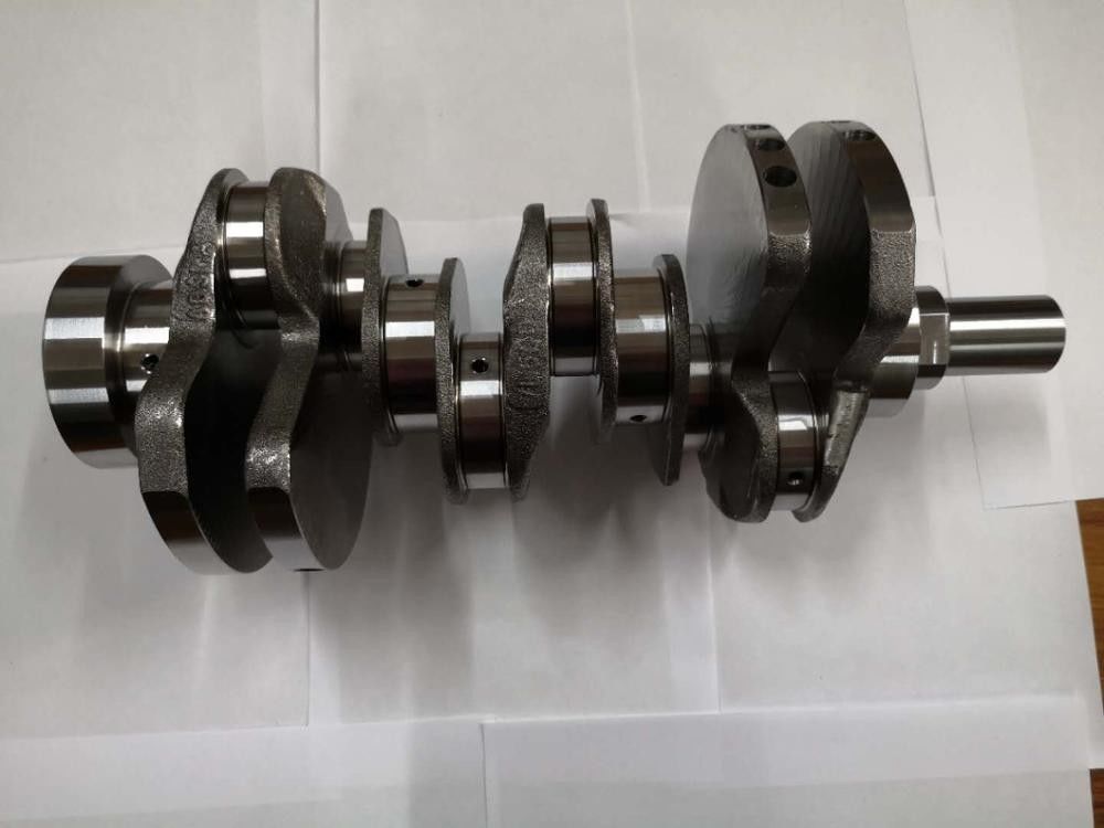 ชิ้นส่วนรถขุดเพลาข้อเหวี่ยงสำหรับ Komatsu 6D114 เพลาข้อเหวี่ยงเหล็กปลอมแปลง 6745-31-1120 6D155 6D170